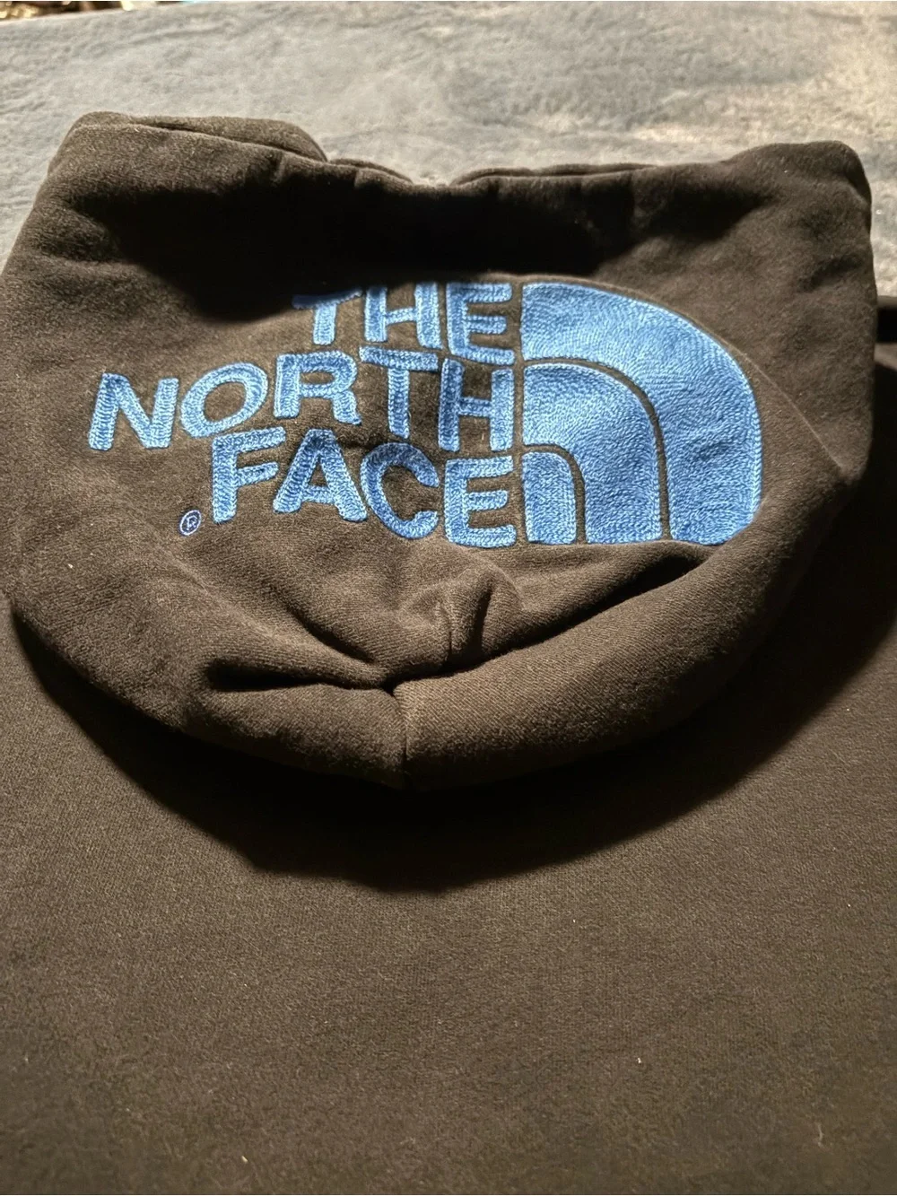 The North Face Black Hoodie with Light Blue Trim